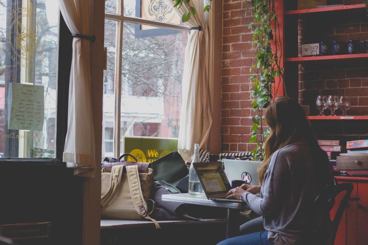 A lady reading a UX designer job description